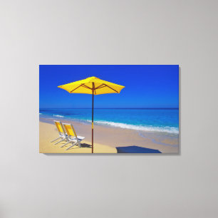 Yellow beach umbrella and chairs on pristine canvas print