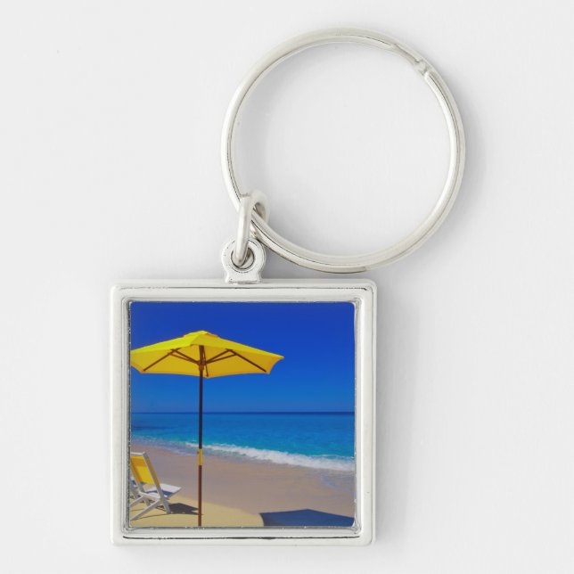 Yellow beach umbrella and chairs on pristine keychain (Front)