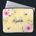 Yellow bees pink florals name laptop sleeve<br><div class="desc">Add some fun and humor to your home office! Yellow, white background with a bee honeycomb pattern and happy smiling bumble bees. Decorated with pink tropical Hibiscus florals , flowers. Template for your name and monogram letter, green and black letters. The name is written with a hand lettered style script....</div>
