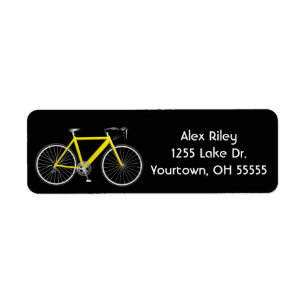 yellow bicycle on black label