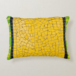 Yellow, black, and green brick wall planning accent pillow