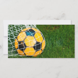 Yellow & Black Soccer Ball in Net