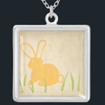 Yellow Bunny and Green Grass by Chariklia Zarris Silver Plated Necklace<br><div class="desc">Blades of green grass poke up from the ground,  surrounding a yellow bunny in this piece by Chariklia Zarris. A great print to place in a child's nursery,  or to give as a gift to someone who loves rabbits!</div>