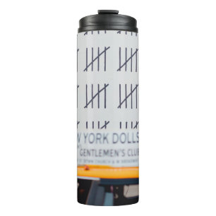 YELLOW CAB IN FRONT OF WHITE PAINTED WALL THERMAL TUMBLER