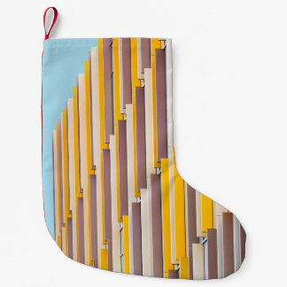 YELLOW CONCRETE BUILDING DURING DAYTIME SMALL CHRISTMAS STOCKING