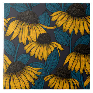 Yellow coneflowers on dark blue tile