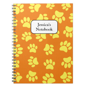 Yellow Dog Paw Prints All Over Orange Notebook