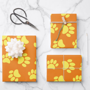 Yellow Dog Paw Prints All Over Orange Wrapping Paper Sheet