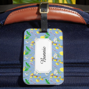 Yellow field flowers on blue luggage tag