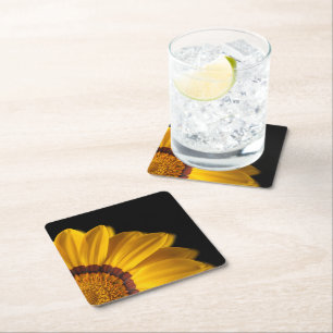 Yellow flower on black background square paper coaster