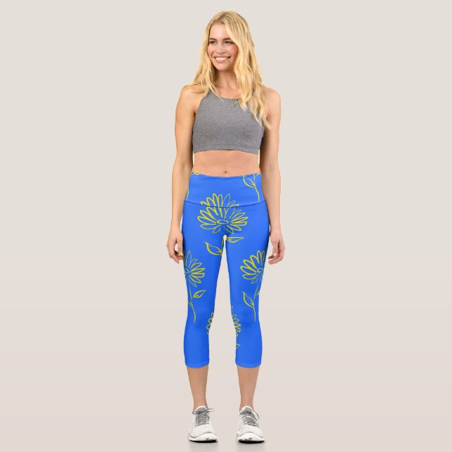 Yellow Flower Outline In A Blue Background Capri Leggings (Front)
