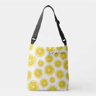 Yellow fresh lemon slice in modern design bag