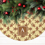Yellow Gingerbread Man Monogram Christmas Brushed Polyester Tree Skirt<br><div class="desc">Brighten up your holiday decor with this cheerful yellow gingerbread man Christmas tree skirt. Featuring an adorable gingerbread man pattern on a warm yellow background, this tree skirt brings a unique, cozy charm to any Christmas display. Personalize it with your family monogram for a one-of-a-kind festive accent that celebrates the...</div>