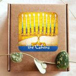 Yellow Gold Hanukkah Menorah Elegant Custom Name Square Sticker<br><div class="desc">A close-up photo of a bright, colourful, yellow gold artsy menorah photo helps you usher in the holiday of Hanukkah. Feel the warmth and joy of the holiday season whenever you use this stunning, colourful Hanukkah sticker. Matching cards, stamps, tote bags, serving trays, and other products are available in my...</div>