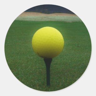 Yellow Golf Ball on a mountain golf course Classic Round Sticker