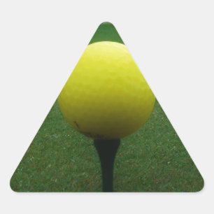 Yellow Golf Ball on a mountain golf course Triangle Sticker