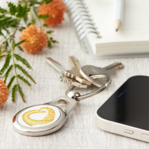 Yellow heart dragon on white keychain
