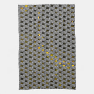 Yellow image under grey plates, oblong squares kitchen towel