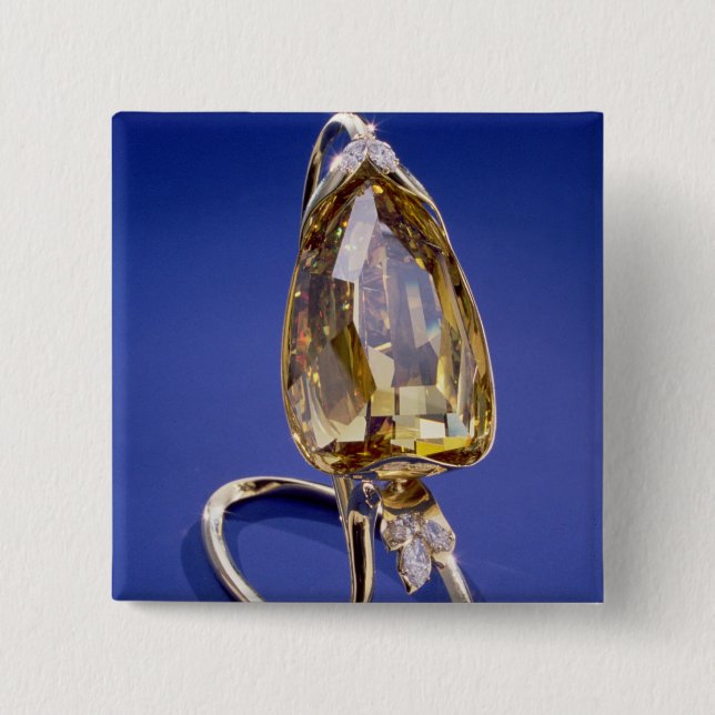 Yellow 'Incomparable' diamond in a gold setting 2 Inch Square Button (Front)