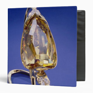 Yellow 'Incomparable' diamond in a gold setting Binder