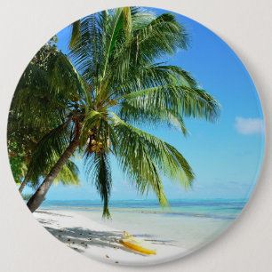 Yellow kayak on a white sand beach button