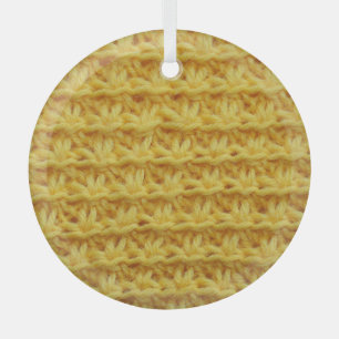 Yellow knitted fabric: striped texture. glass ornament