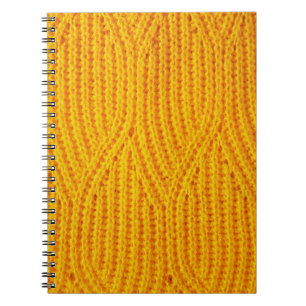 Yellow knitted surface textile material background notebook