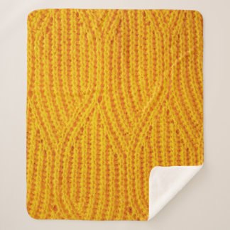 Yellow knitted surface textile material background sherpa blanket