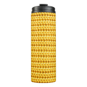 Yellow knitted woollen fabric background thermal tumbler