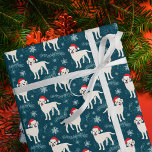 Yellow Labrador Retrievers in Christmas Hats Wrapping Paper<br><div class="desc">Cute labrador retrievers in santa hats with snow and snowflakes in the background. The background colour is customizable.</div>