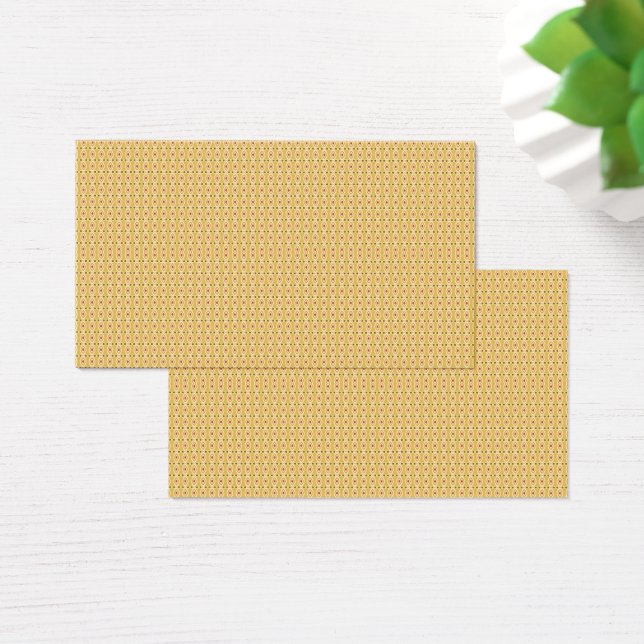 Yellow, orange, and brown sheets of wrapping paper (Desk)