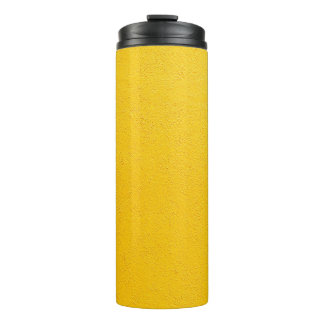 Yellow painted wall thermal tumbler