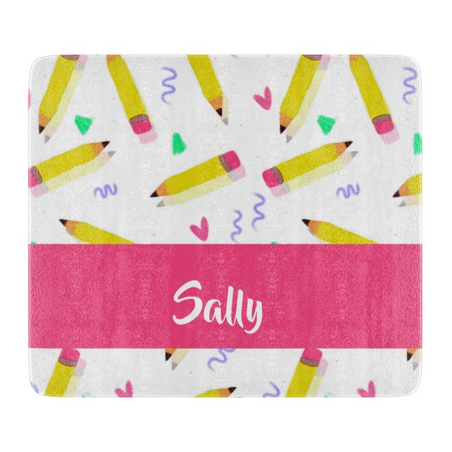 Yellow pencils and scrabbles on white cutting board (Front)