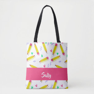 Yellow pencils and scrabbles on white tote bag