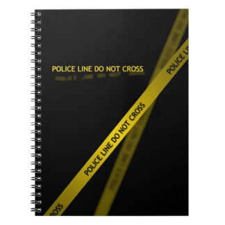 yellow police line black notebook