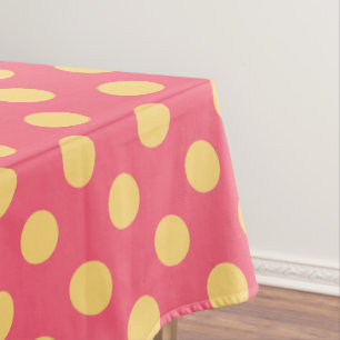 Yellow polka dots on coral tablecloth