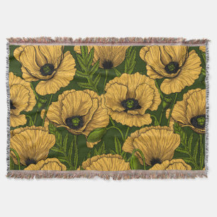 Yellow poppies on dark green throw blanket