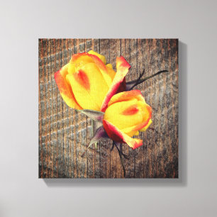 Yellow Rosebud Flowers On Barnboard Canvas Print