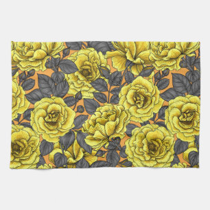 Yellow roses with blue leaves on blue kitchen towel