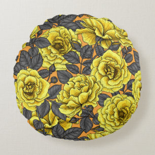 Yellow roses with grey leaves on orange round pillow