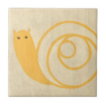 Yellow Snail on Cream Background Tile<br><div class="desc">This yellow snail is much cuter than real snails! An enchanting Chariklia Zarris print,  the cream background blends well with the yellow colour of the snail. A great piece to place on the wall of a child's room!</div>