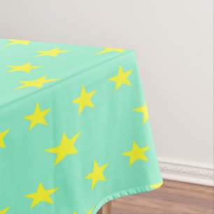 Yellow stars on turquoise tablecloth
