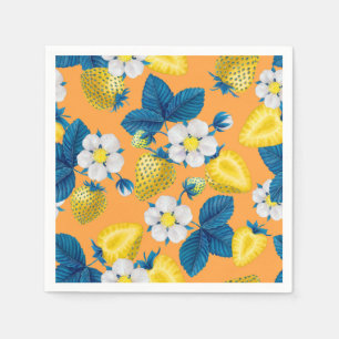Yellow strawberries on orange napkin