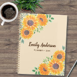 Yellow Sunflower Personalized 2023 Planner<br><div class="desc">This pretty Planner is decorated with watercolor sunflowers and green foliage on a soft beige background. The text is dark brown. You can personalize it by adding your name and changing the year. Use the Design Tool option to change the text size, style, and colour. Because we create our artwork...</div>