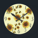 Yellow Sunflowers and Honey Bees Summer Pattern Round Clock<br><div class="desc">This summery and cute summer sunflowers and honey bees pattern on pale yellow is perfect for the trendy and stylish woman. Its playful and cool design is great for many gifts and occasions; for yourself,  your friends,  or your family. Enjoy this bright and charming pattern for your next purchase!</div>