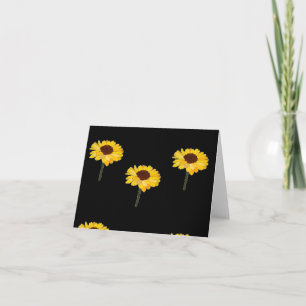 Yellow sunflowers on black card
