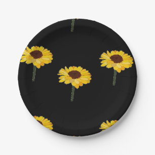 Yellow sunflowers on black paper plate