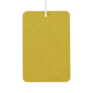 Yellow textured surface with  swirling pattern air freshener