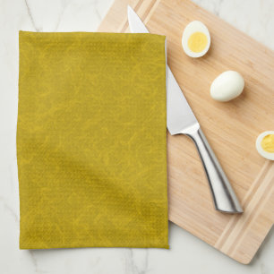Yellow textured surface with swirling pattern kitchen towel