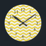 Yellow Tight Chevron Pattern Round Clock<br><div class="desc">Chic chevron pattern, very trendy. It is very easy to add your name, or any text and customize your product. Designed with stripes in form of connected V shapes that form a geometric wave, this pattern looks very contemporary and hip. Chevrons are very popular. These fun patterns are stylish and...</div>
